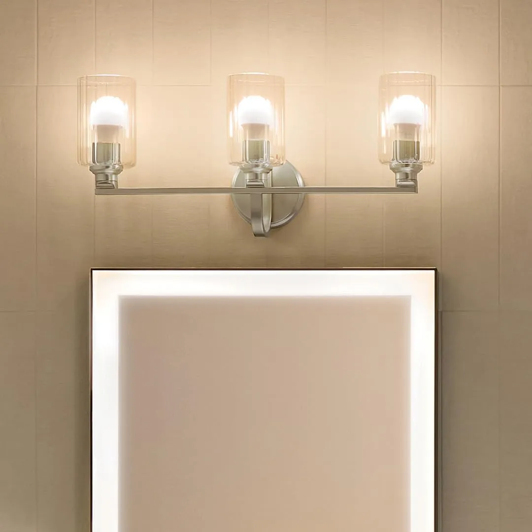 Kichler Gioe 24.25" 3-Light Vanity Light with Clear Fluted Glass in Brushed Nickel, Damp Rated, for Bathroom, Powder Room, Over a Mirror, (24.25" W x 10.5" H), 55226NIFLU