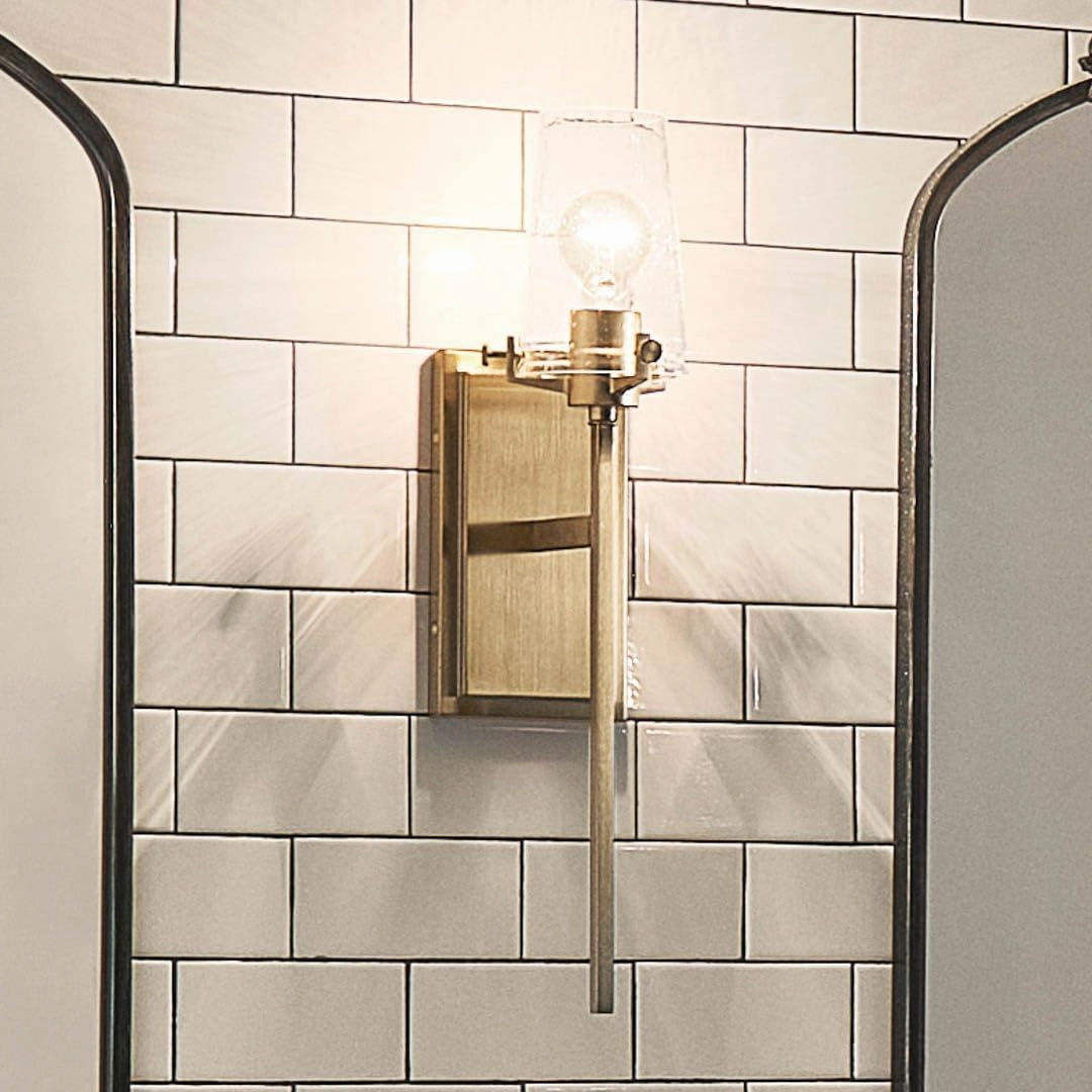 Kichler, Alton 22.25 inch 1 Light Wall Sconce with Clear Seeded Glass in Champagne Bronze for Hallway, Entry, Bathroom and Powder Room, (22.25" H x 5" W x 7.5" Ext), 45295CPZ