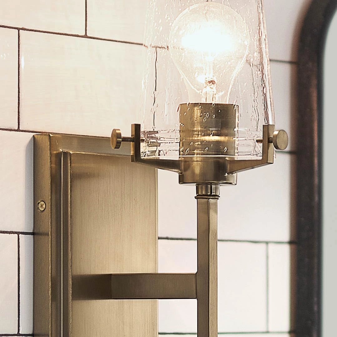 Kichler, Alton 22.25 inch 1 Light Wall Sconce with Clear Seeded Glass in Champagne Bronze for Hallway, Entry, Bathroom and Powder Room, (22.25" H x 5" W x 7.5" Ext), 45295CPZ