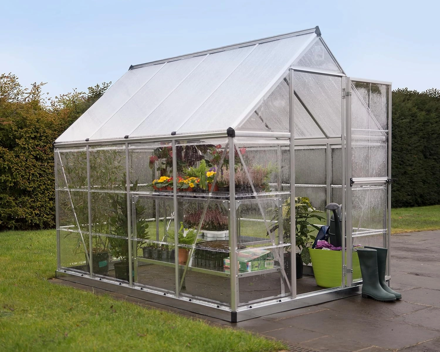 Palram - Canopia 6x8 Greenhouse for Outdoors, Walk-In, UV Polycarbonate Panels, Heavy Duty Aluminum Frame, Lockable Door, Adjustable Roof Vent, Rain Gutters, Galvanized Steel Base, Hybrid (Silver)
