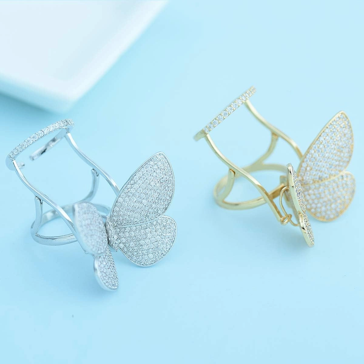 TEMICO Moving and Flying Butterfly CZ Paved Platinum Plated Fashion Party Cocktail Ring Wide Band for Women